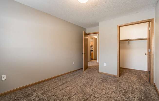 Bedroom with large walk in closet at Skyline View Apartments in Lincoln NE