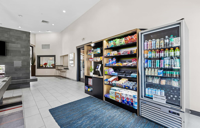 A modern kitchen with a refrigerator and a counter.