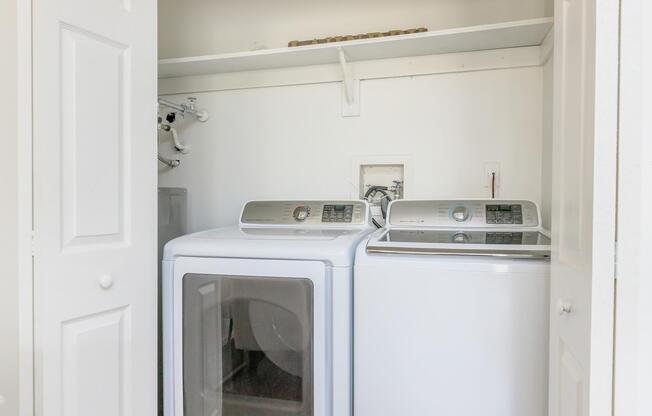 a kitchen with a sink and a microwave