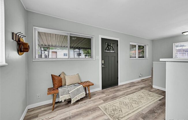 LOCATION LOCATION!!  LOHI Italian styled single family home.  Remodeled with LVT flooring, Granite counter tops & fenced-in-yard!