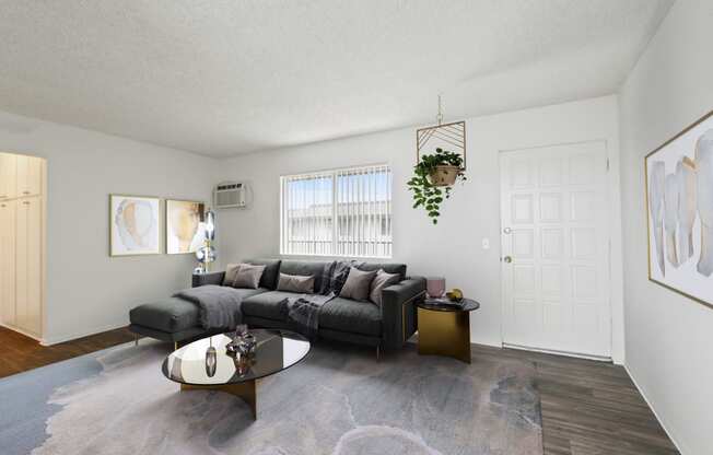 a living room with a couch and a coffee table