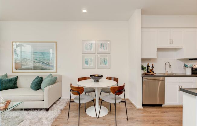 a living room filled with furniture and a fireplace