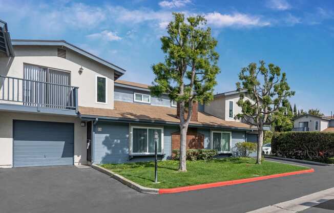 Front View of Units with Single Attached Garage. Two Story Townhome