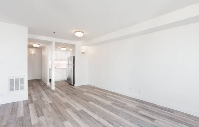 a kitchen and living room in a 555 waverly unit