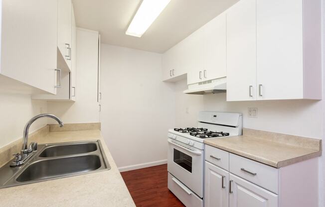 Kitchen with White Appliances and White Cabinets