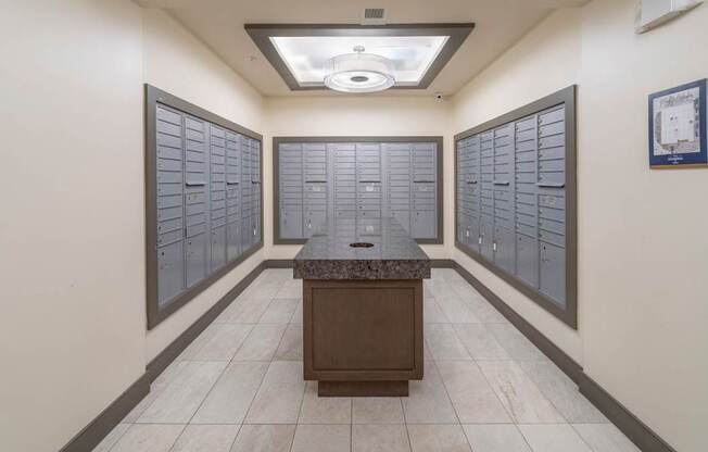 a room with lockers and a table in the middle at The Hendrix, Atlanta