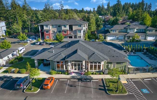 Little Tuscany Apartments & Townhomes - Aerial View of Clubhouse, Outdoor Pool, Apartment Building, Townhomes, Parking Lot