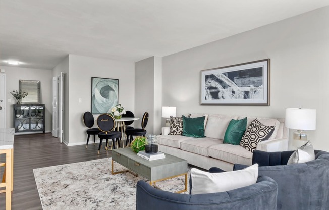 a living room with gray walls and a white couch