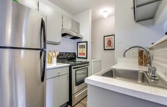 Fully Equipped Kitchen with Stainless Steel at Wildwood Apartments, CLEAR Property Management, Austin, TX