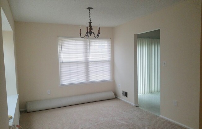 Updated, spacious, centrally located end-unit townhouse with lots of amenities in exclusive Governor's Pointe!
