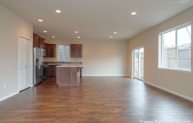 Spacious 4-Bedroom + Office Home in Abbey Creek – Modern Finishes, EV Charger & Low-Maintenance Backyard