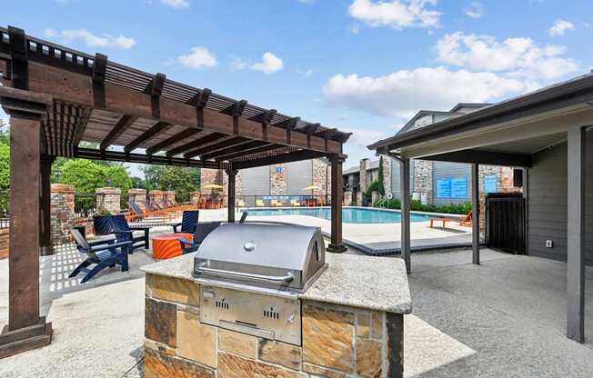 Pool and grill at Brighton Place in Lewisville, TX
