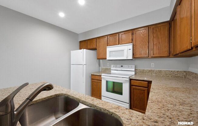Spacious 2 Story Townhome + finished basement in a great SE location.