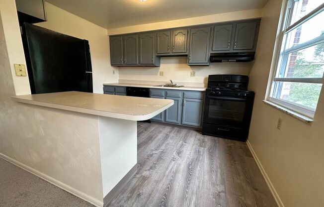 Enticing 2BR Townhouse with Central A/C and Attached Garage! Call Today!