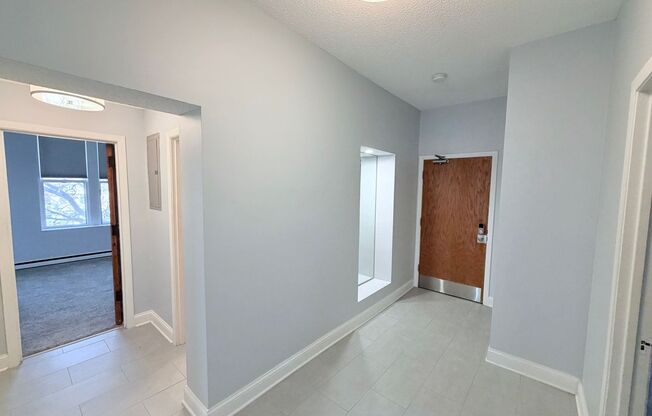 Light-Filled Cathedral Hill Condo with Vaulted Ceilings & Garage!