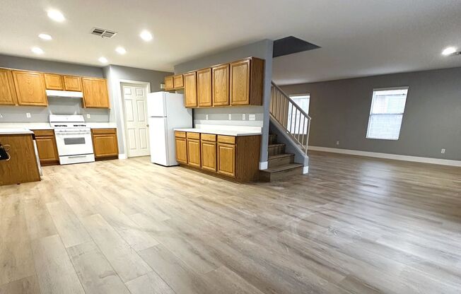 North Summerlin home with open floor plan and large kitchen area! New vinyl plank flooring!