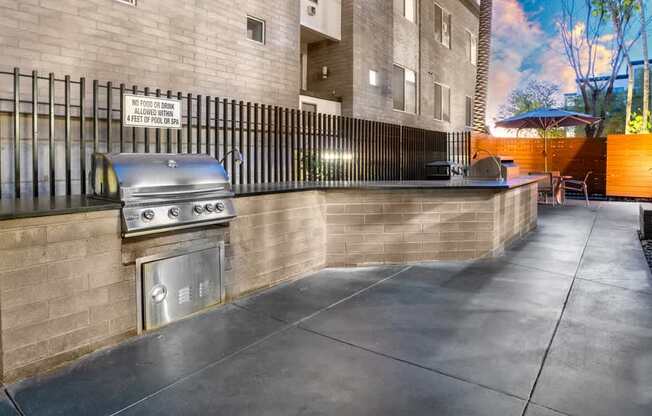 A sign on a fence states "No food or drinks allowed on balcony.".
