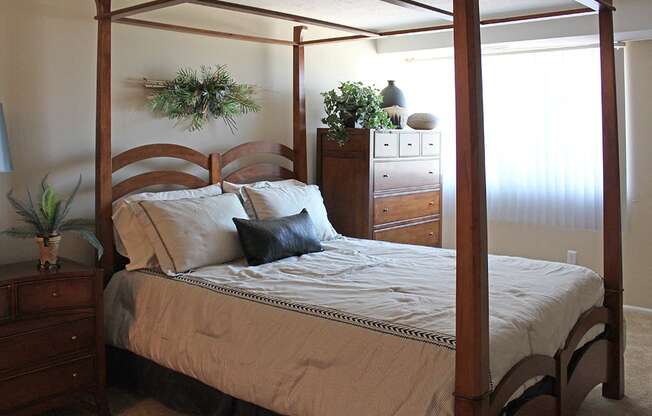 Model Bedroom with cozy bed at Willoughby Hills Towers, Willoughby Hills