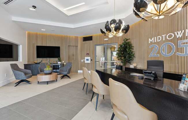 a lobby with a reception desk and chairs