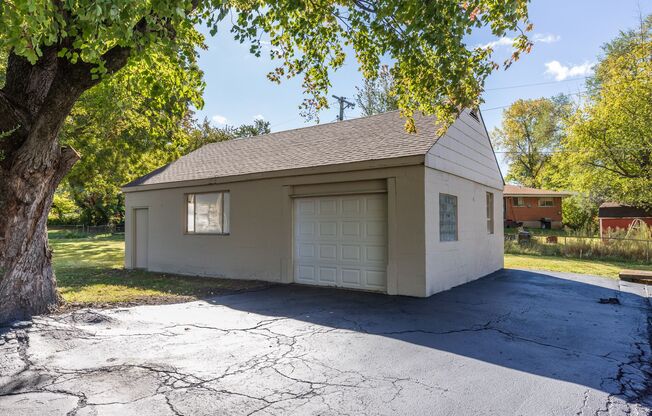Spacious St. Ann Home with Large Detached Garage - Presented By Tiffany Gerling's Team