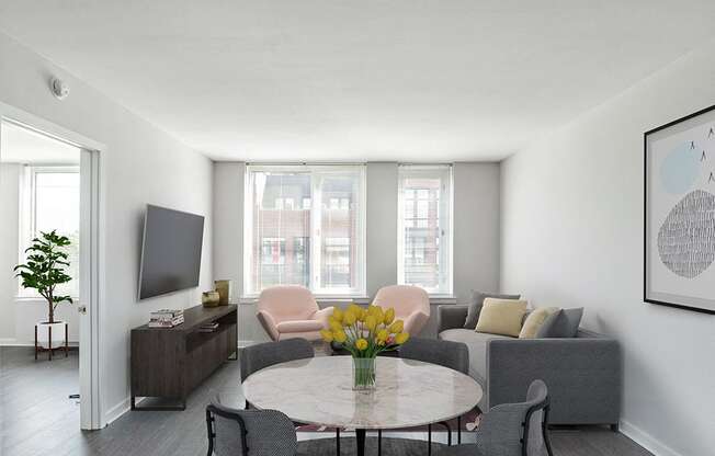 a living room with a table and chairs and a geometric ceiling at 34 Berry, Brooklyn, New York
