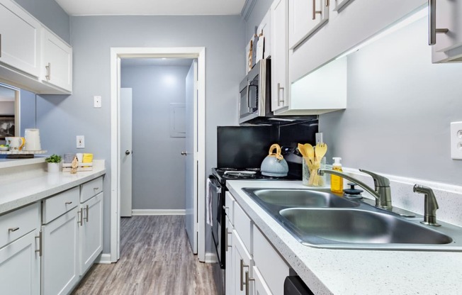 the preserve at ballantyne commons apartment kitchen with stainless steel appliances