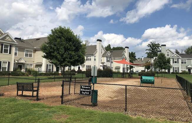 a fenced in dog park at Millennium Apartments Greenville SC