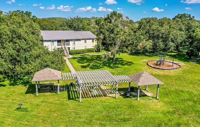 a birds eye view of a house and a playground