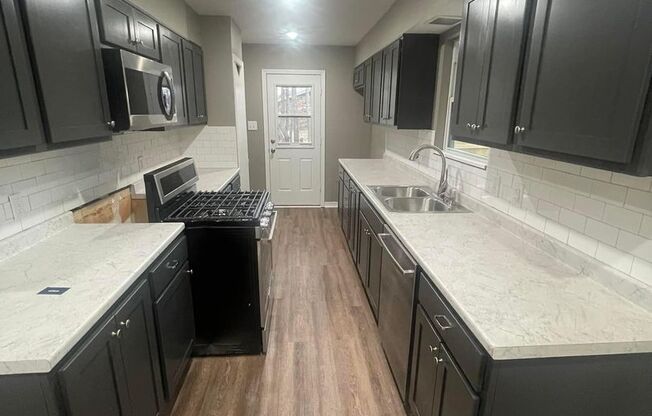 Come take a look at this remodeled three-bedroom two-bathroom home