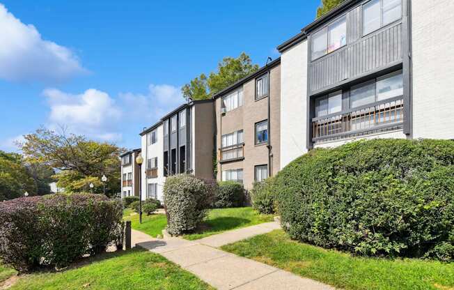 A residential area with apartment buildings and greenery.