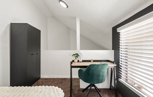 A 4 bedroom, 2 bathroom apartment with common areas and a fully functional kitchen at 1823 Pelham Ave. Unit #7