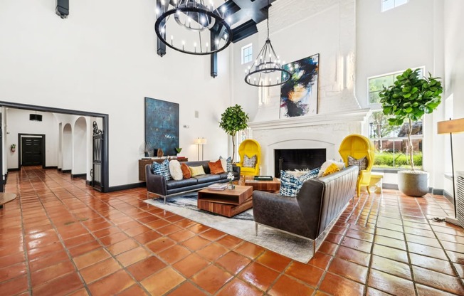 a living room with couches and a fireplace