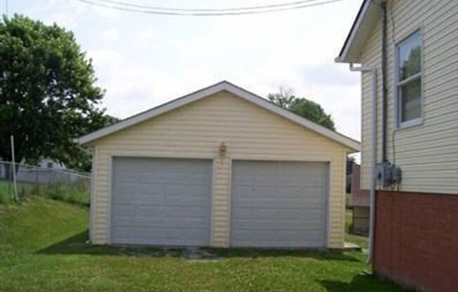 4 Bedroom 3 Bath House with 2 Car Detached Garage