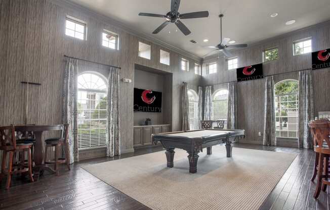clubhouse with billiards table and TVs