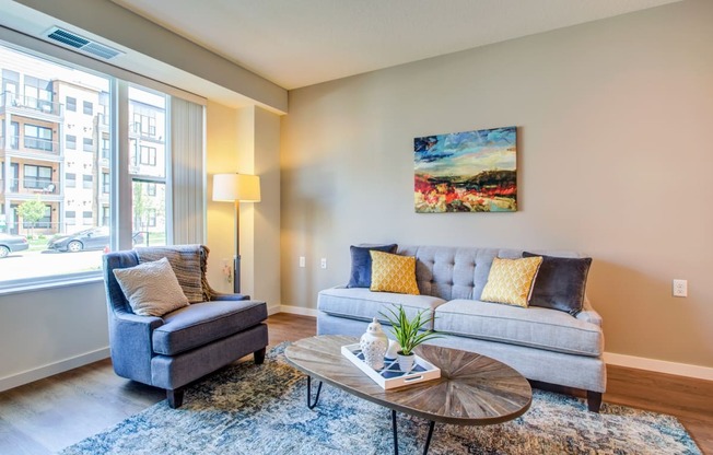 Living Room With Plenty Of Natural Light at The Legends at Berry 62+ Apartments, St. Paul, Minnesota