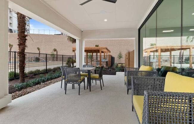 Living room with yellow sofa1 at Reveal Skyline  at La Cantera, San Antonio, 78256