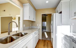 LOVELY ONE STORY CONDO WITH ONE CAR GARAGE