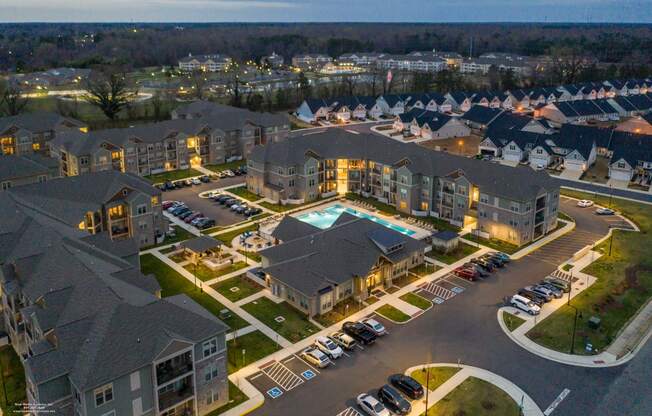 an aerial view of a large apartment complex with a swimming pool at The Whitworth, Virginia, 23185