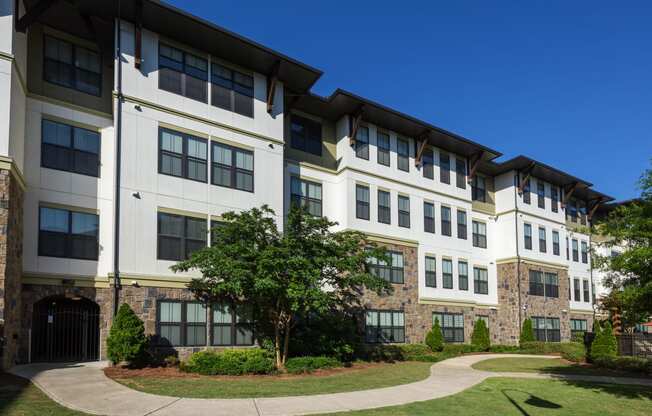 Building Exterior and Green Space at 4700 Colonnade Apartments in Birmingham, AL