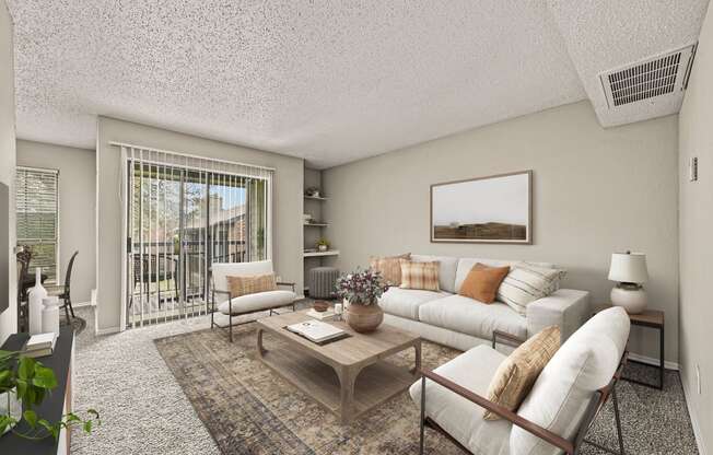 a living room with a white couch and a coffee table at Legacy Apartments in Plano, TX