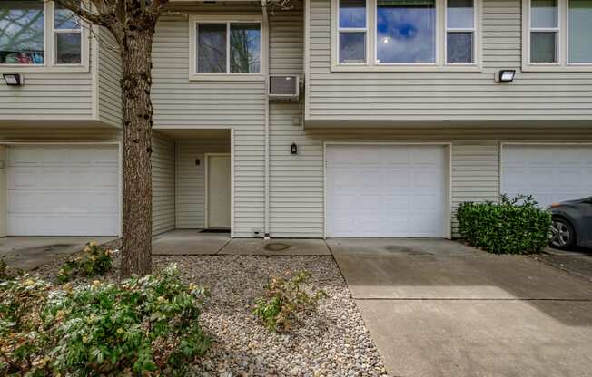 front of the house with two garages