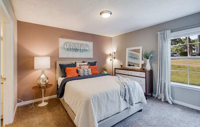 Bedroom with Plush Carpet and Large Window