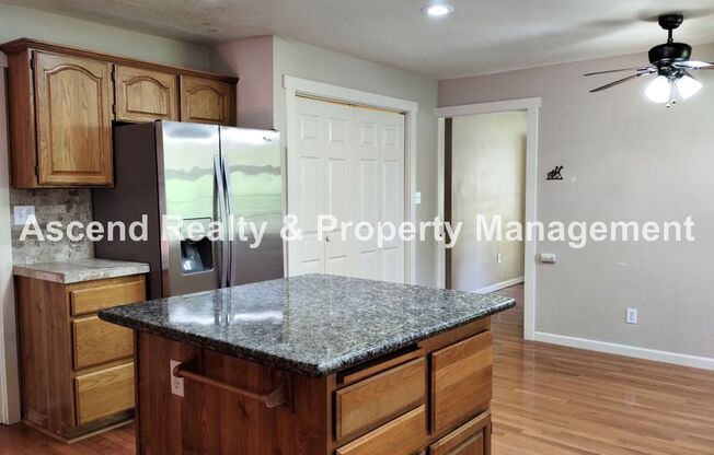 Spacious One Level Open Floor Plan with Large Kitchen, Central AC, Oversize Deck & Garden Containers Corner Lot