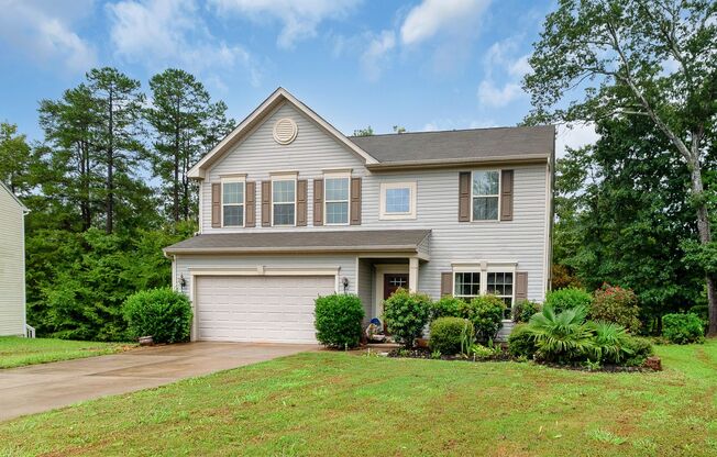 Spacious 4-Bedroom Home with Sunroom, Deck & Private Backyard Views!