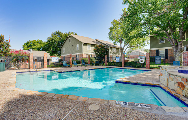main pool with lounge chairs  at Arbors Of Cleburne, Cleburne, 76033