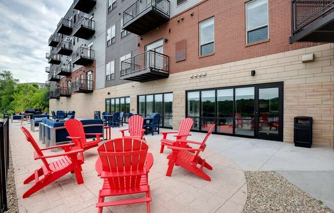 Outdoor patio with grilling and seating at Lake Jonathan Flats, Chaska