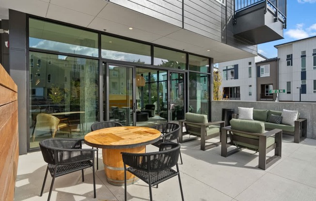 A patio with a table and chairs is shown.