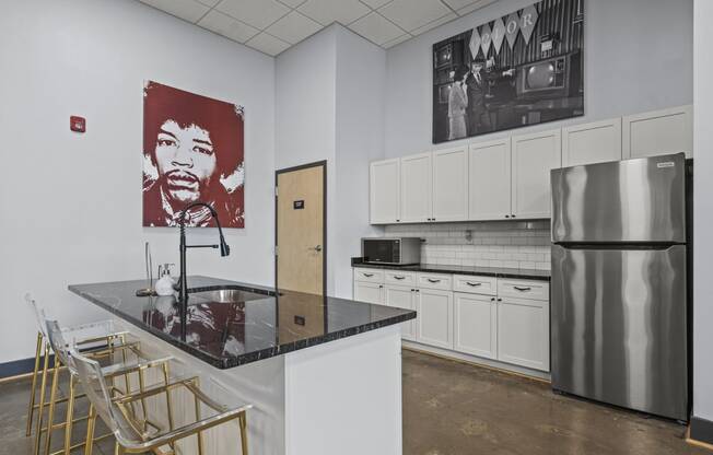 a kitchen with a counter top and a refrigerator  at The Icon, Richmond, Virginia