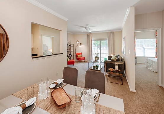 Dining room next to living room; doorway to bedrom