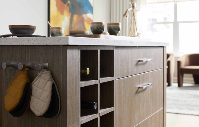 Find both style and functionality with the kitchen island's built-in storage at Modera Clarendon.